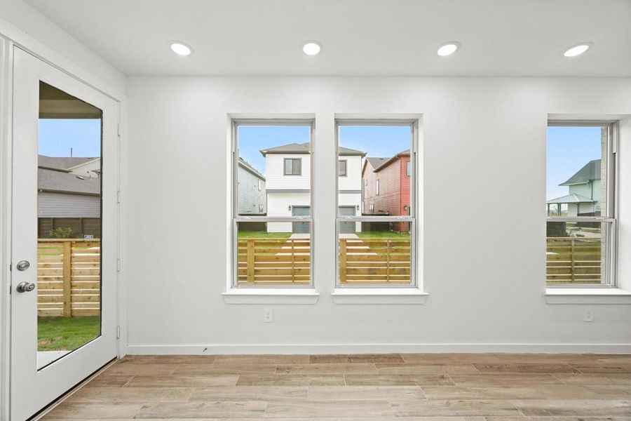 The dining room is bright and airy, with windows that fill the space with natural light. The dining room is bright and airy, with windows that fill the space with natural light.