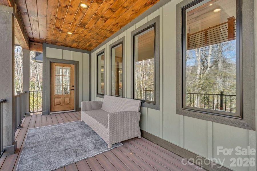 Covered back deck with river views Covered back deck with river views