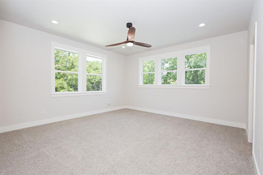 Wake up to serene tree-line views in this private Owner’s Suite. All walls in the home are insulated offering peace and privacy. Wake up to serene tree-line views in this private Owner’s Suite. All walls in the home are insulated offering peace and privacy.