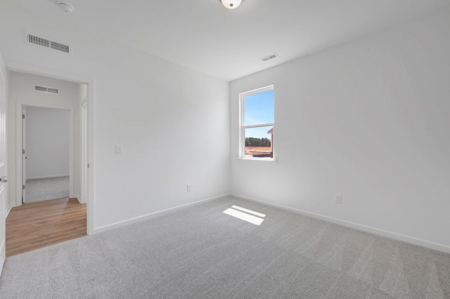 Spacious, unfurnished interior of a new home in Providence Creek, Fuquay Varina (Image 20).