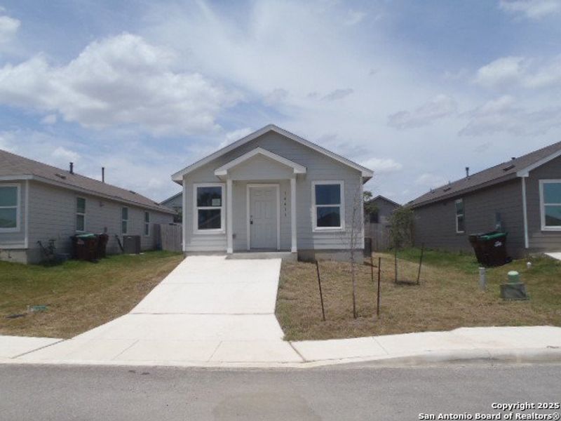 Front exterior of a new home in , San Antonio, TX, highlighting curb appeal (Image 17).