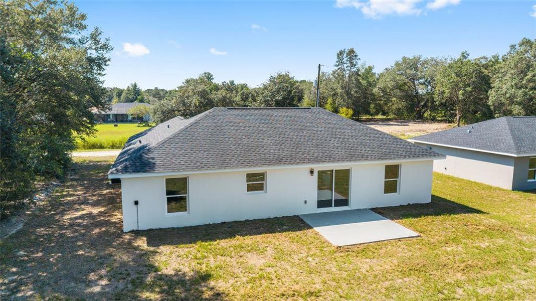 Front exterior of a new home in , Dunnellon, FL, highlighting curb appeal (Image 15).