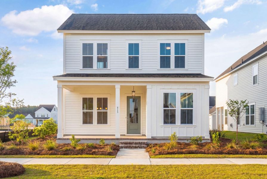 Front exterior of a new home in Nexton, Summerville, SC, highlighting curb appeal (Image 1). Front exterior of a new home in Nexton, Summerville, SC, highlighting curb appeal (Image 1).