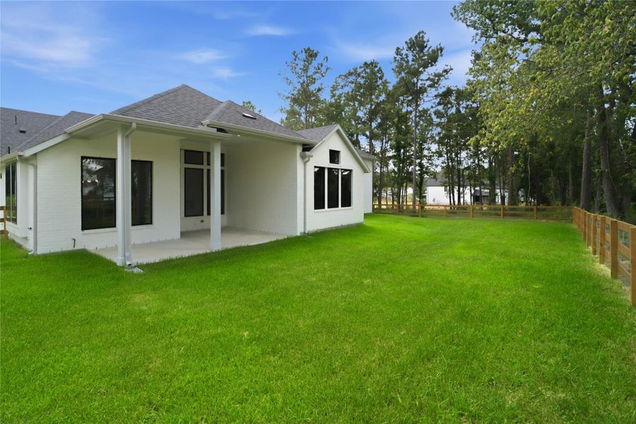Exterior details and patio area of a home in Timber Hollow, Magnolia (Image 32). Exterior details and patio area of a home in Timber Hollow, Magnolia (Image 32).