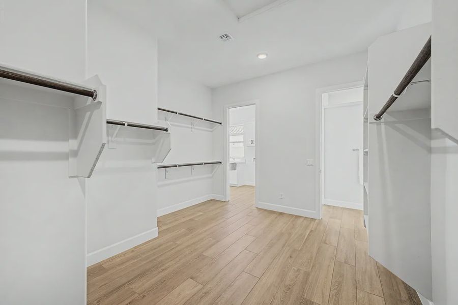 Spacious, unfurnished interior of a new home in Bellero Estates, Queen Creek (Image 23).