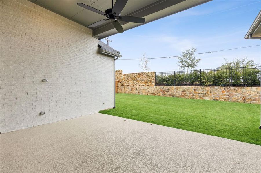Dining al fresco is in your future on this lovely covered back patio. Dining al fresco is in your future on this lovely covered back patio.
