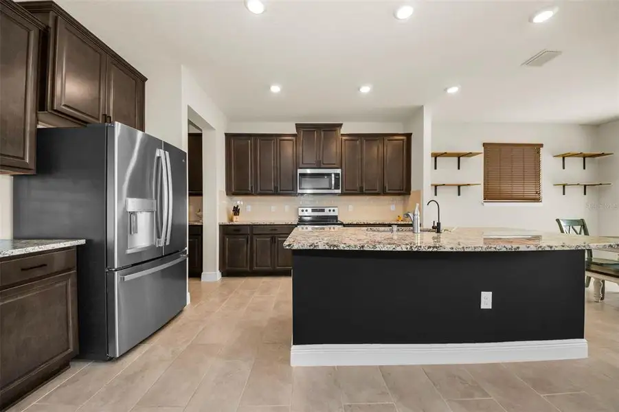 Furnished interior view inside a new home in Mangrove Manor, Apollo Beach (Image 13). Furnished interior view inside a new home in Mangrove Manor, Apollo Beach (Image 13).