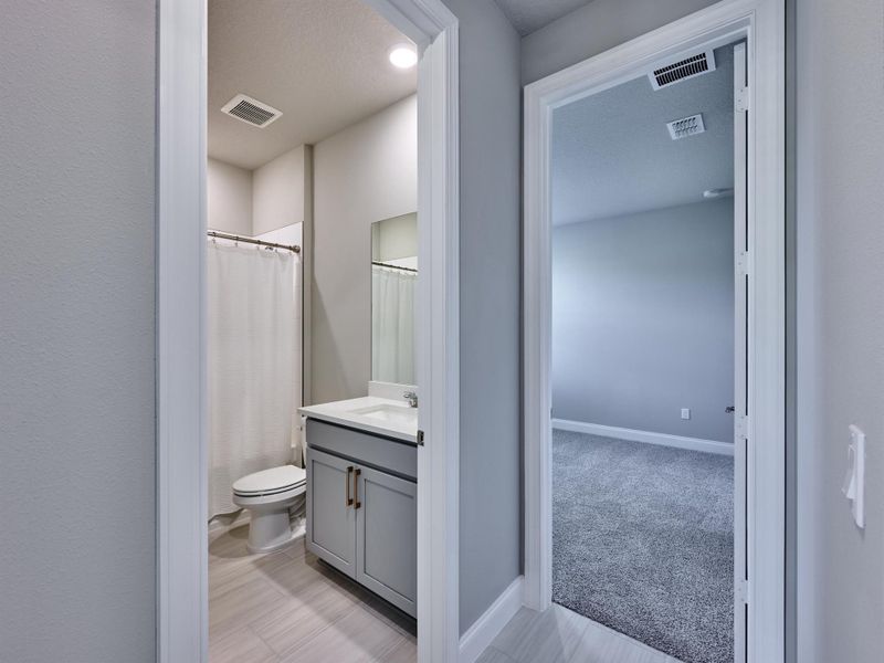 Furnished interior view inside a new home in Azalea, Port St. Lucie (Image 32).