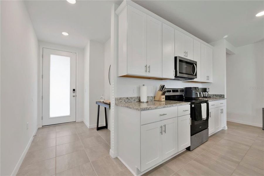Furnished interior view inside a new home in , Haines City (Image 9).