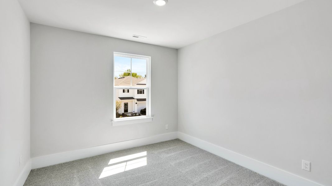 Spacious, unfurnished interior of a new home in The Pines at Blake Farm, Wilmington (Image 26).