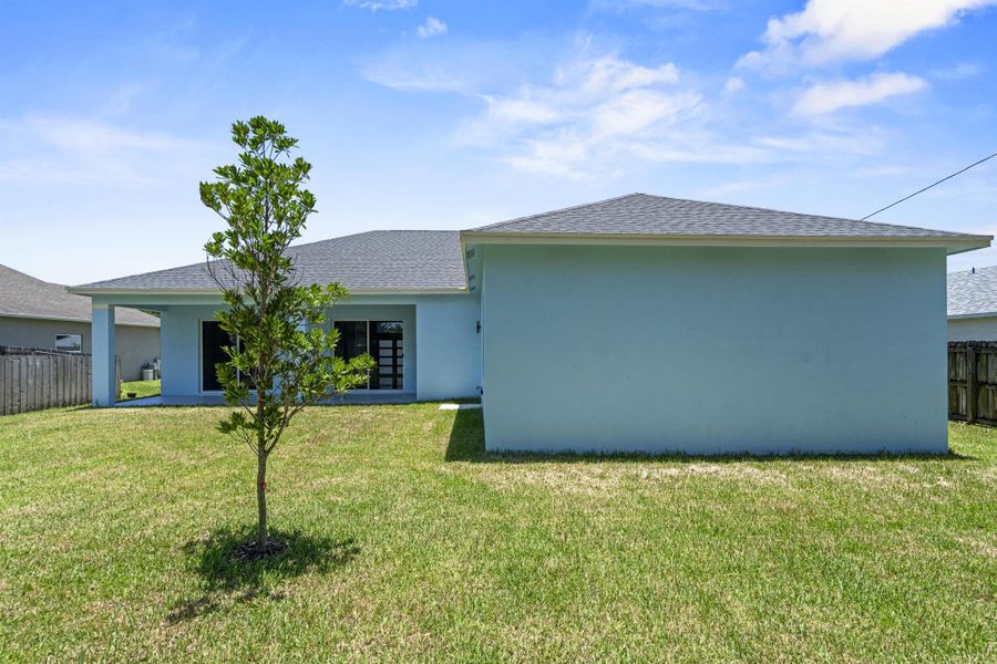 Front exterior of a new home in , Port St. Lucie, FL, highlighting curb appeal (Image 18).