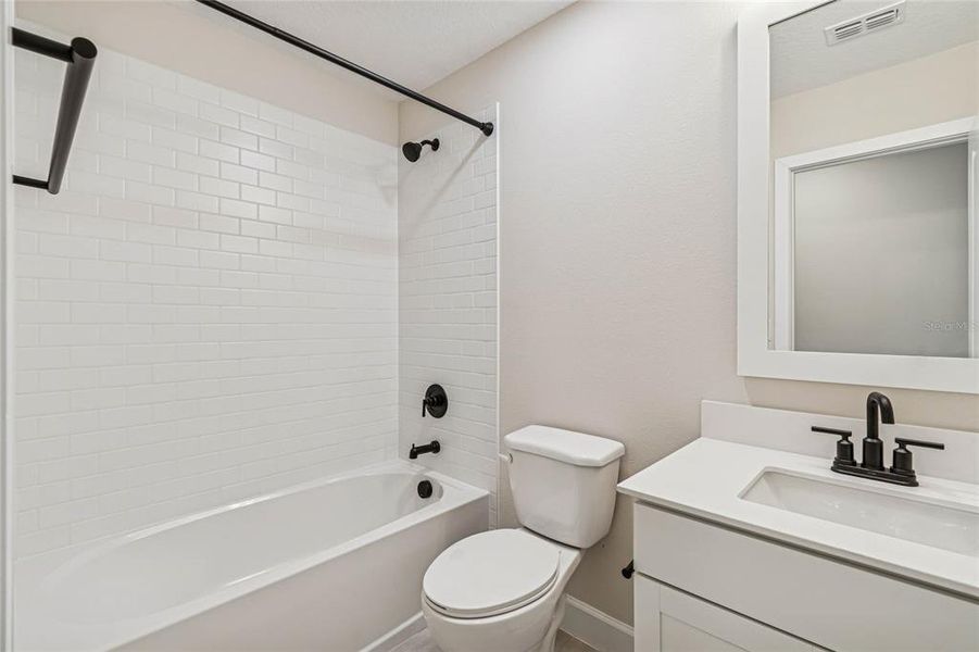 Furnished interior view inside a new home in Aspire at Canter Creek, Davenport (Image 8).