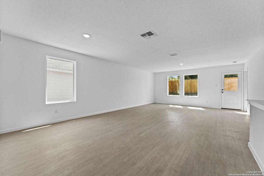 Spacious, unfurnished interior of a new home in Torian Village: Watermill Collection, San Antonio (Image 22).