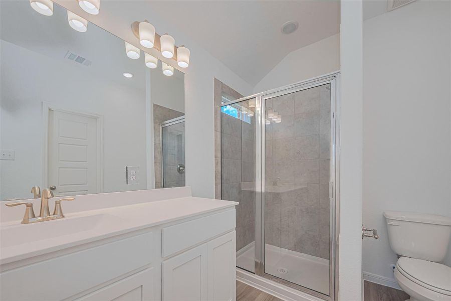 Furnished interior view inside a new home in Sunterra, Katy (Image 12).