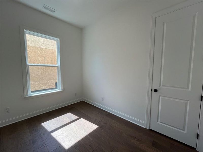 Spacious, unfurnished interior of a new home in East Harbor II at Chestatee, Dawsonville (Image 27).