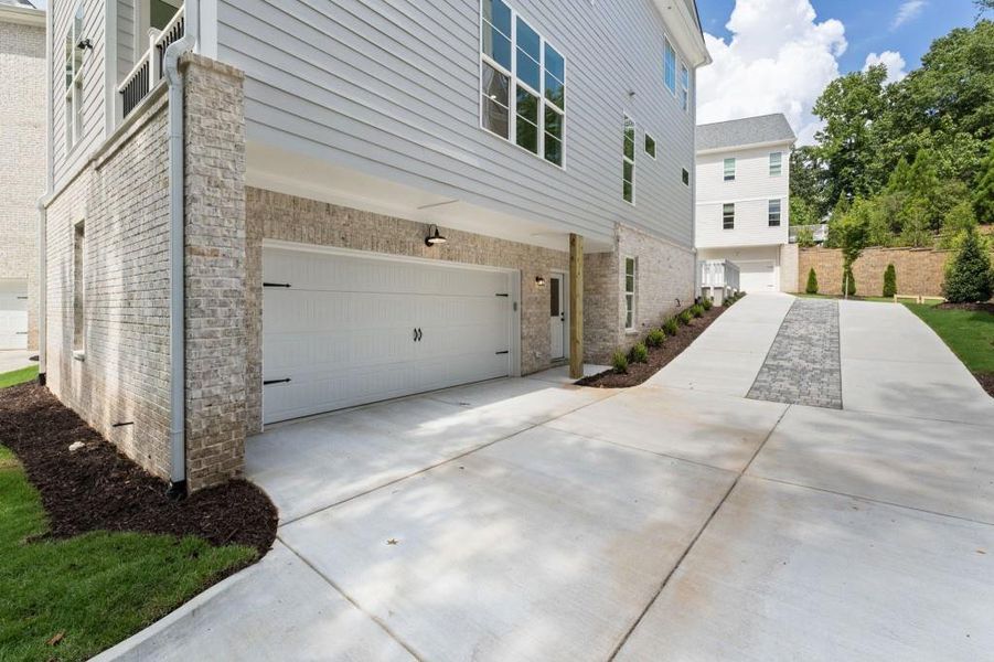 Front exterior of a new home in Parkside Roswell, Roswell, GA, highlighting curb appeal (Image 25).