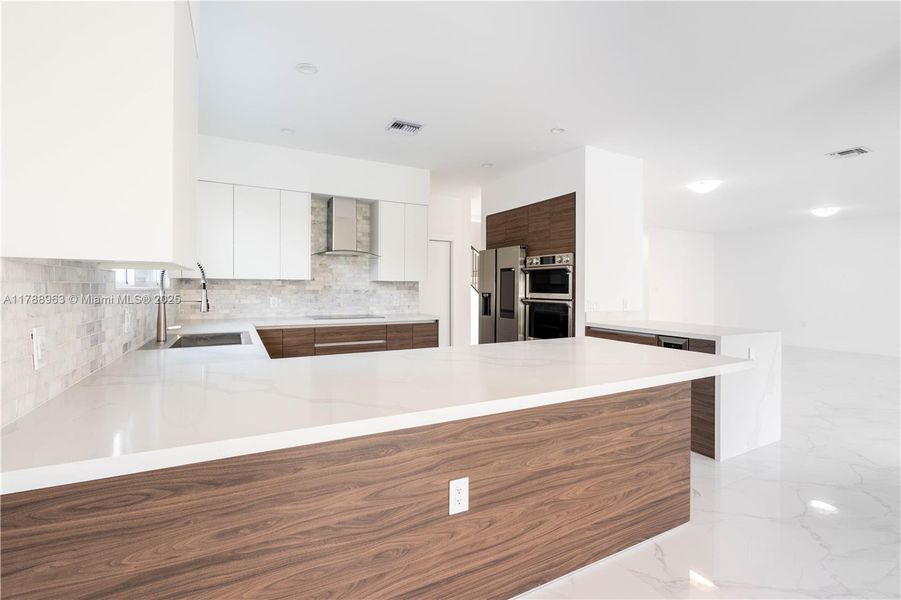 Furnished interior view inside a new home in , Miami (Image 9).