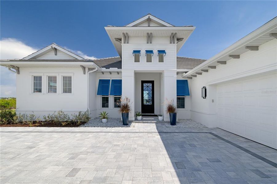 Front exterior of a new home in , Palmetto, FL, highlighting curb appeal (Image 21).