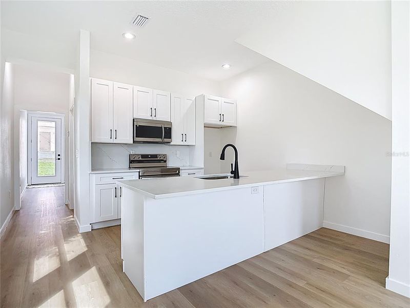 Furnished interior view inside a new home in , Tampa (Image 7).