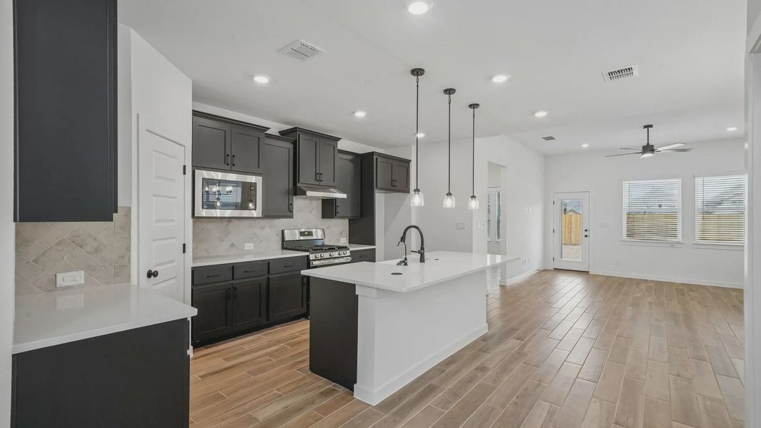 Representative furnished interior of a home built from the Sage by Chesmar Homes in Legacy at Lake Dunlap, New Braunfels (Image 4). Representative furnished interior of a home built from the Sage by Chesmar Homes in Legacy at Lake Dunlap, New Braunfels (Image 4).
