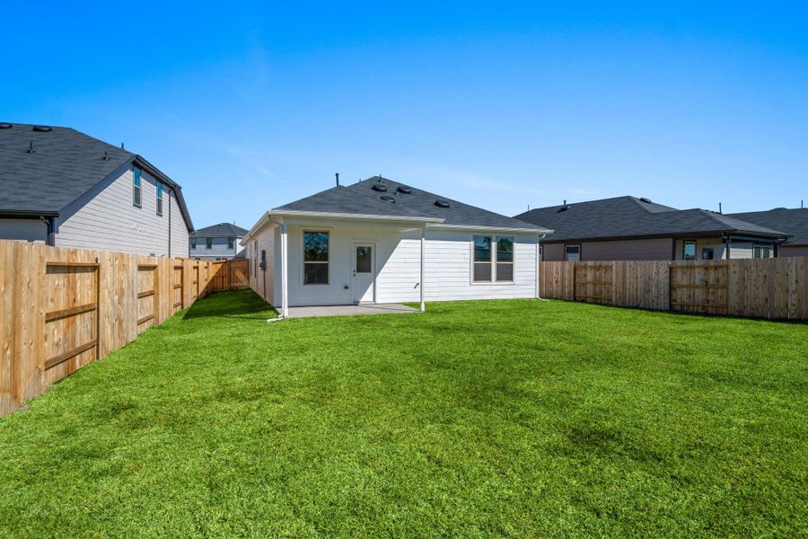 Exterior details and patio area of a home in Crosby Farms, Crosby (Image 2).
