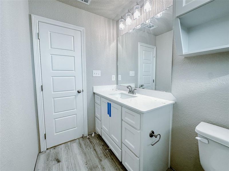 Furnished interior view inside a new home in , Hewitt (Image 3).