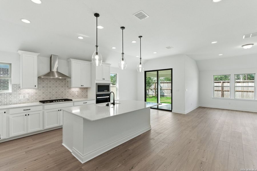Furnished interior view inside a new home in Nopal Valley, San Antonio (Image 12).