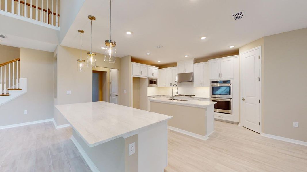 Representative furnished interior of a home built from the Barbuda by Taylor Morrison in Headwaters at Lofton Creek, Yulee (Image 10).