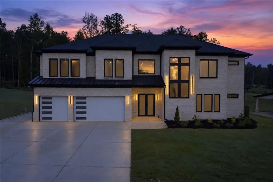 Front exterior of a new home in , Auburn, GA, highlighting curb appeal (Image 1). Front exterior of a new home in , Auburn, GA, highlighting curb appeal (Image 1).