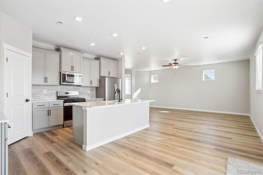 Furnished interior view inside a new home in Second Creek Farm, Commerce City (Image 7).