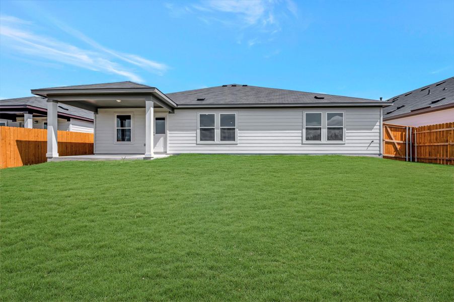 Exterior details and patio area of a home in Carillon, Manor (Image 3).