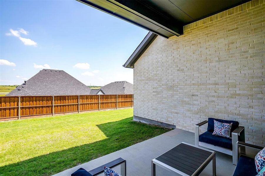 View of yard with a patio area View of yard with a patio area