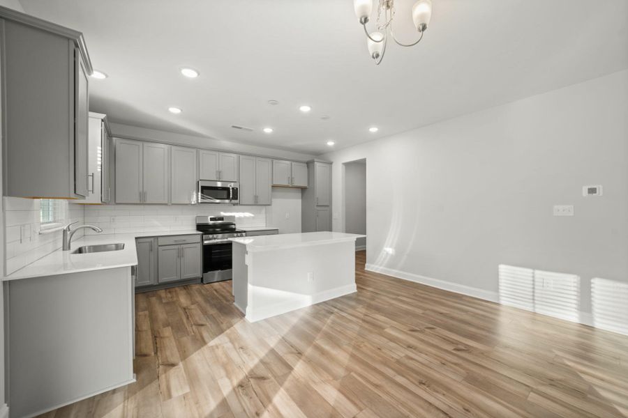 Spacious, unfurnished interior of a new home in Cottages at Piper Village, Trinity (Image 23).