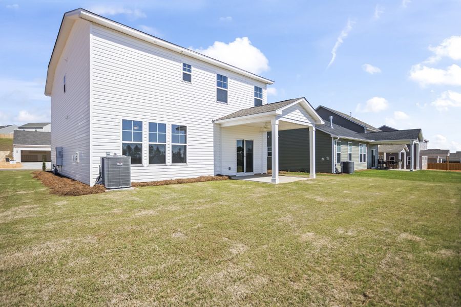 Exterior details and patio area of a home in Providence Station at Trolley Run, Aiken (Image 22).