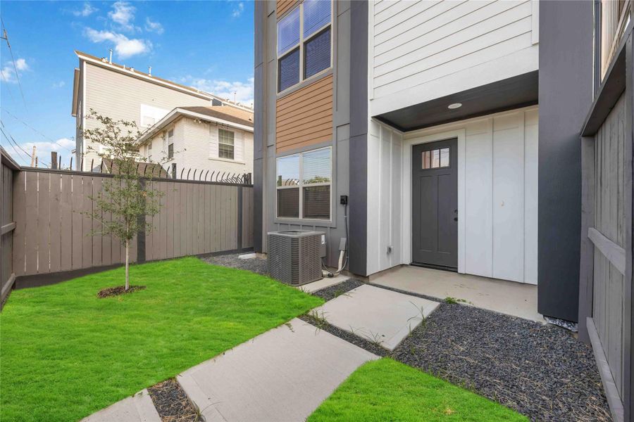 Front door with green space- 3 homes left have front green space