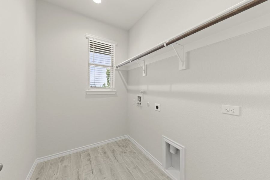 Representative exterior photo of a completed home built from the Cottonwood by Impression Homes in Northspur, Terrell, TX (Image 24).