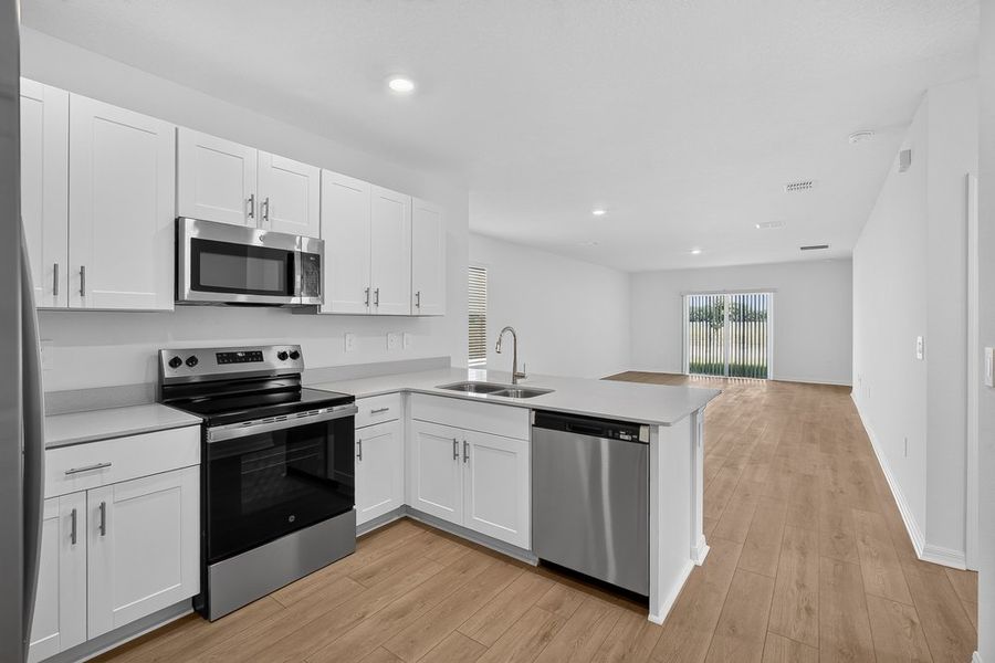 Furnished interior view inside a new home in Palm Wind, Hudson (Image 5).