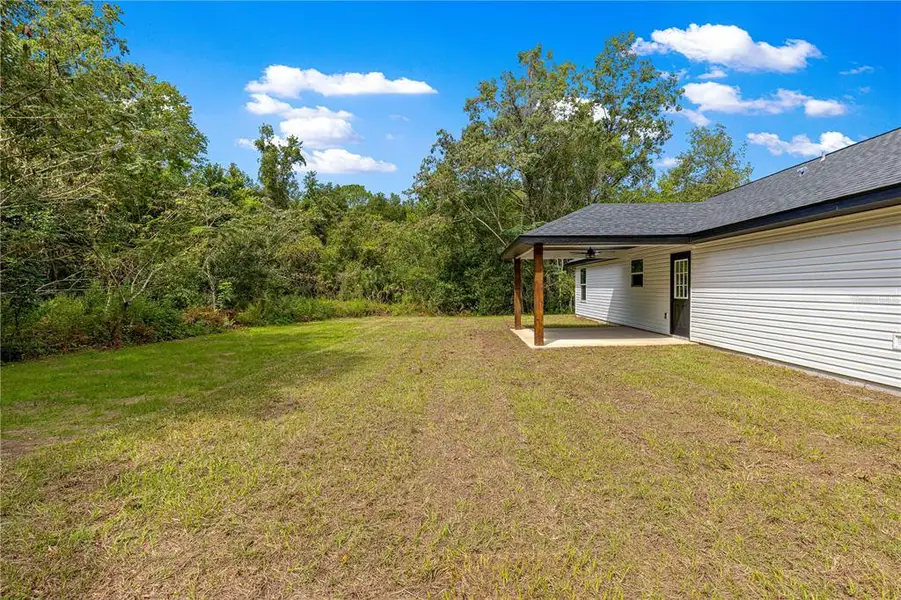 Exterior details and patio area of a home in , Ocala (Image 3). Exterior details and patio area of a home in , Ocala (Image 3).