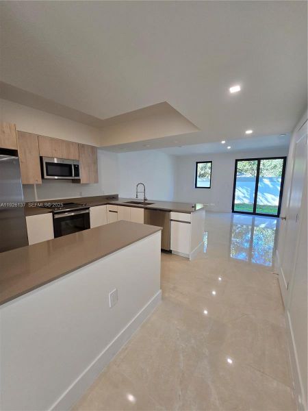 Furnished interior view inside a new home in , Dania Beach (Image 2).