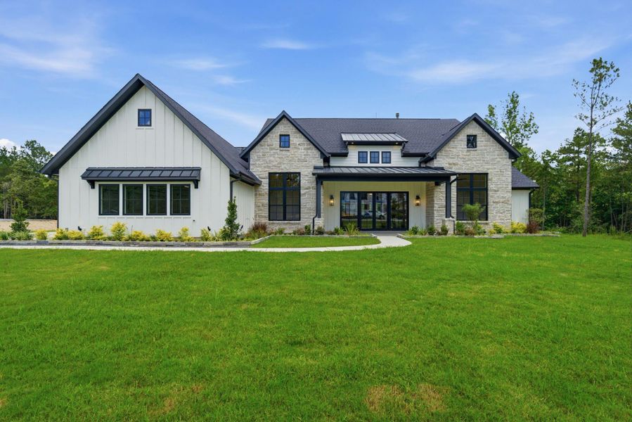 Front exterior of a new home in , Montgomery, TX, highlighting curb appeal (Image 25).