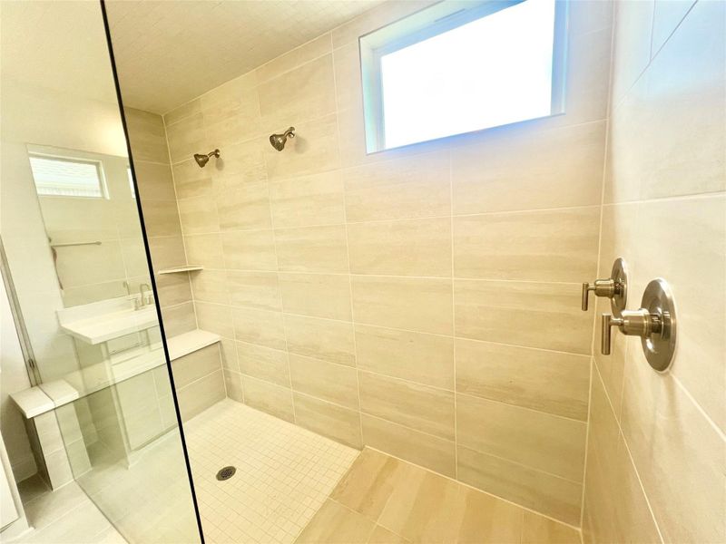 Bathroom with a tile shower Bathroom with a tile shower