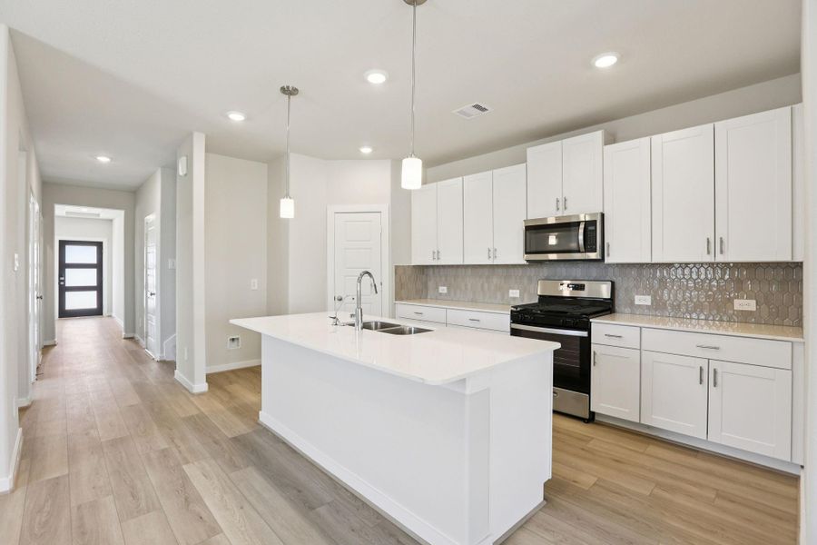 Photos are not of the actual home, but are photos of the builder home with same floorplan with similar interior finishes.