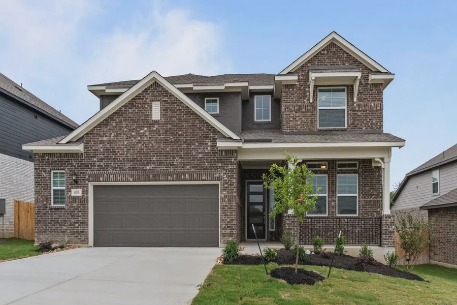 Representative exterior photo of a completed home built from the Maddie by Chesmar Homes in Buffalo Crossing, Cibolo, TX (Image 1). Representative exterior photo of a completed home built from the Maddie by Chesmar Homes in Buffalo Crossing, Cibolo, TX (Image 1).