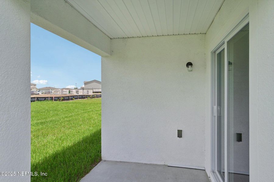 Exterior details and patio area of a home in River Hill, Welaka (Image 2).
