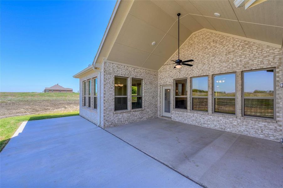 View of patio featuring ceiling fan