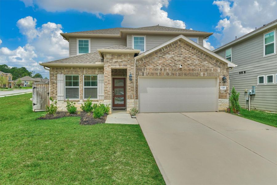 Front exterior of a new home in , Montgomery, TX, highlighting curb appeal (Image 21).