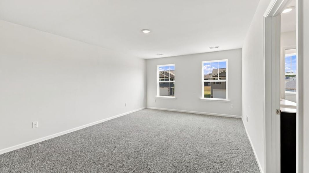 Spacious, unfurnished interior of a new home in Bentley Park, Greenwood (Image 32).