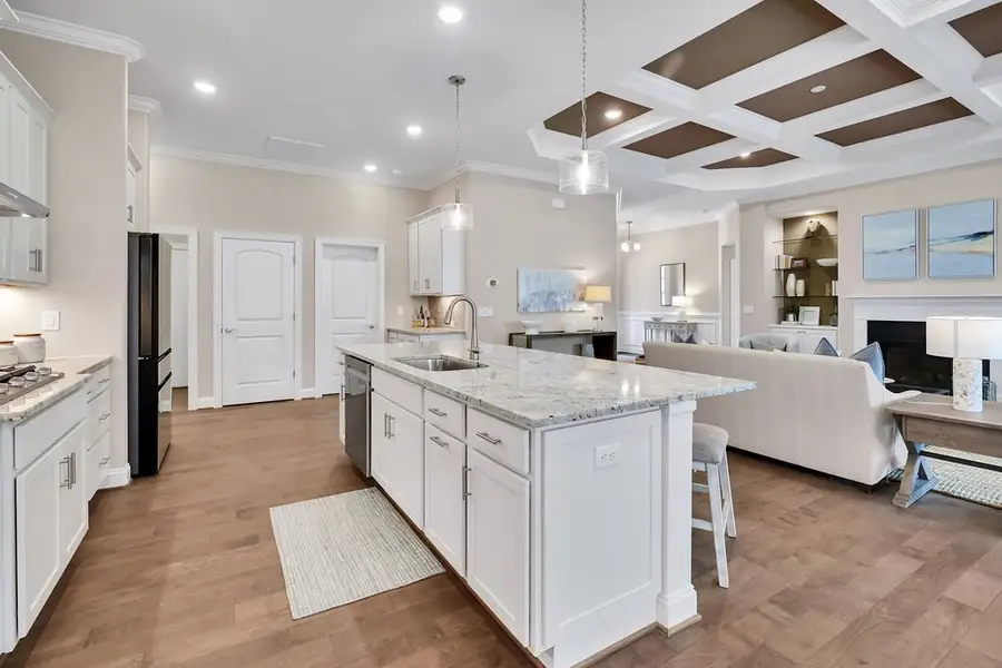 Furnished interior view inside a new home in The Bluffs On the Cape Fear, Leland (Image 7).