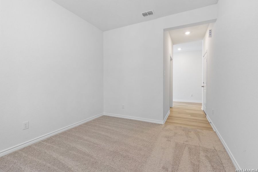 Spacious, unfurnished interior of a new home in Hidden Bluffs at TRP, San Antonio (Image 14).