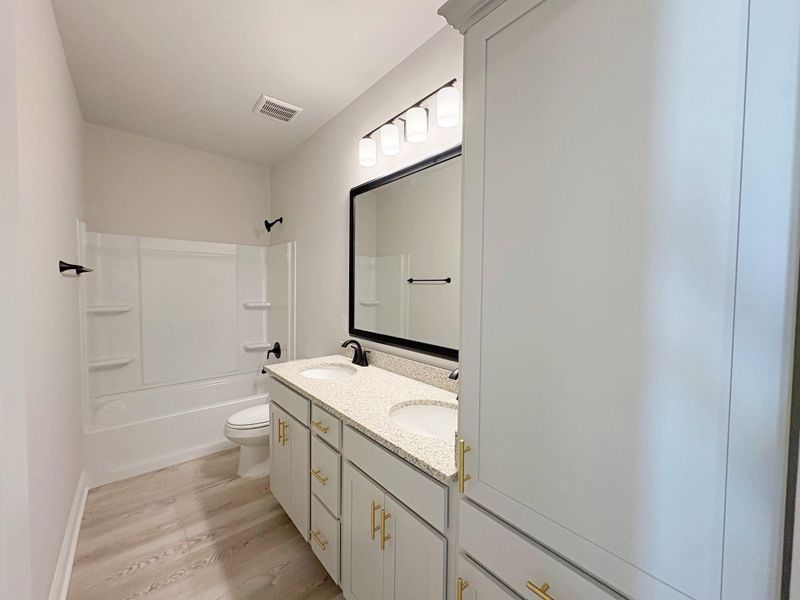 Furnished interior view inside a new home in Little Cypress Grove, Orange (Image 6). Furnished interior view inside a new home in Little Cypress Grove, Orange (Image 6).